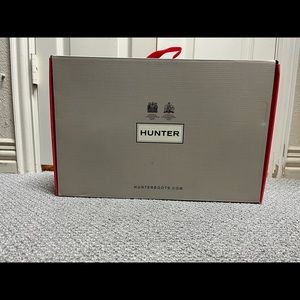 NWOT Hunter tall black rain boots for women.
